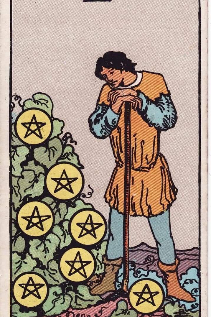 The Seven of Pentacles card from the Rider-Waite-Smith tarot deck
